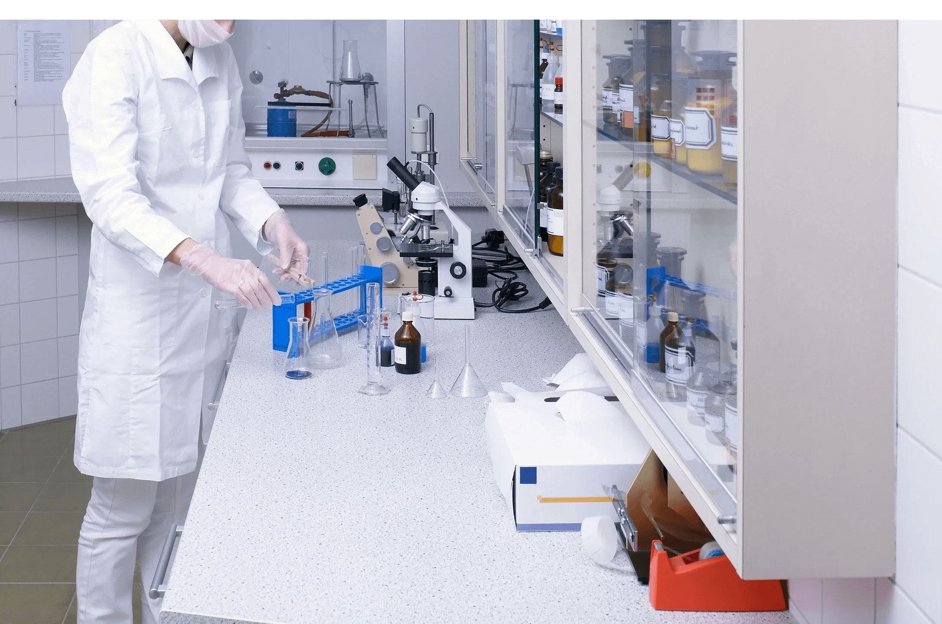 Advanced research laboratory facility with analytical instrumentation and modern workstation benches